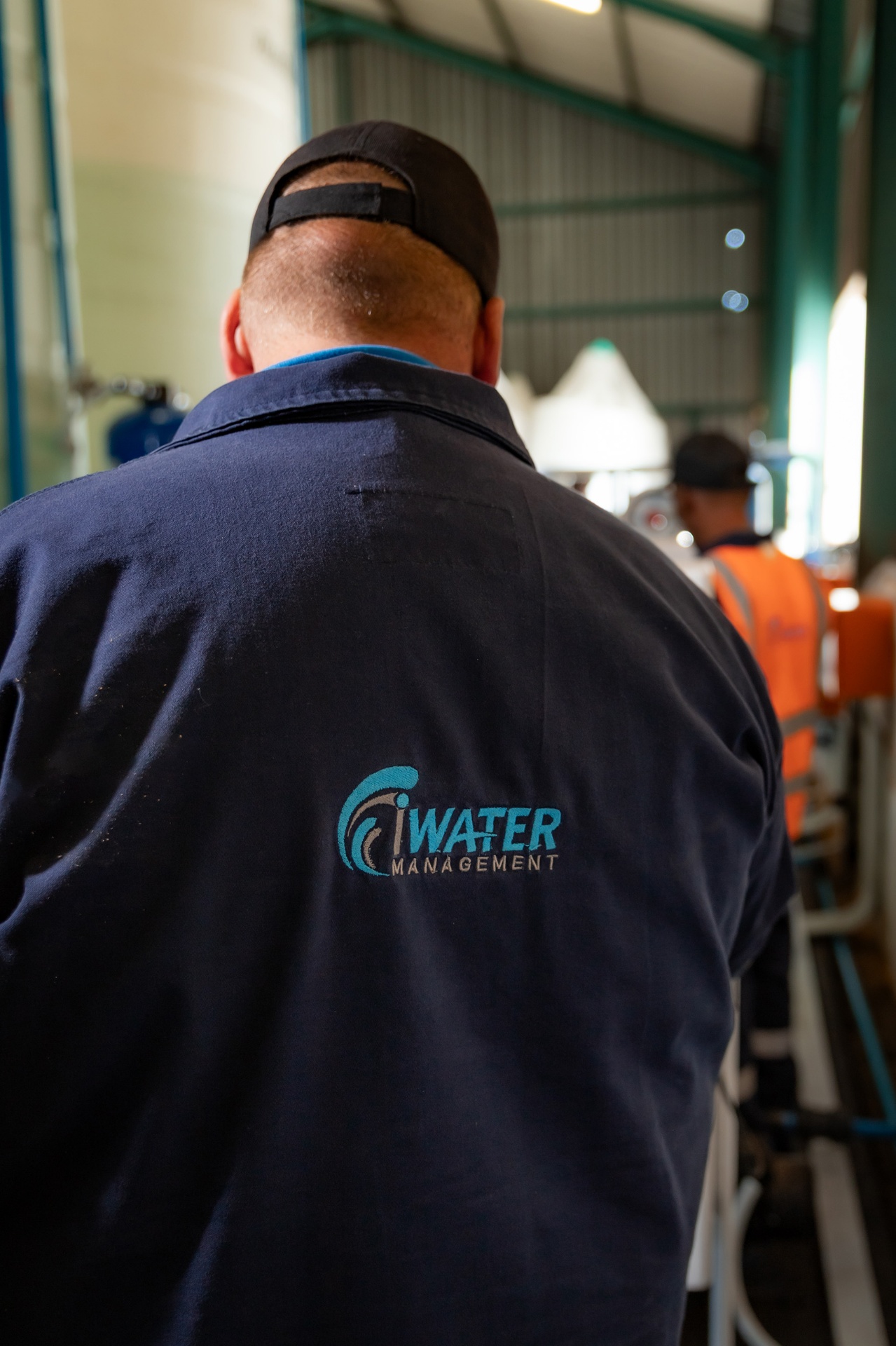 Owner in branded jacket