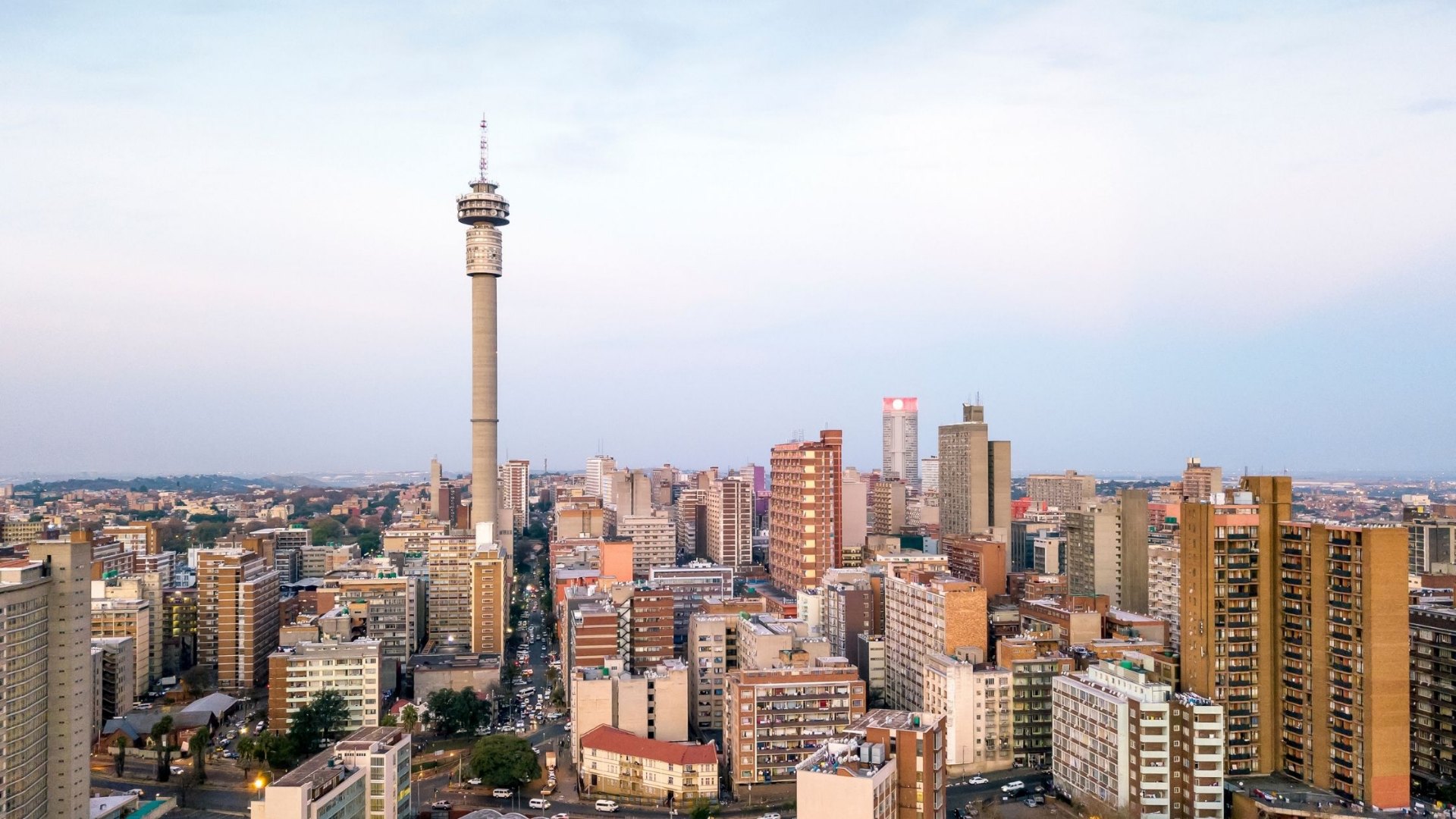 Johannesburg skyline with water infrastructure and distribution network in the foreground.