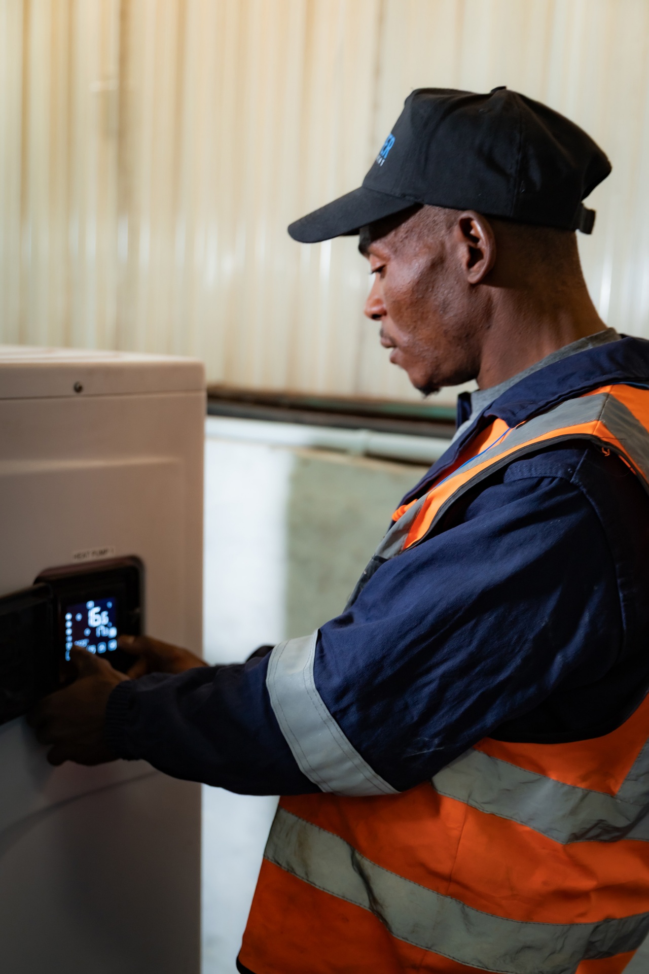 Technician with heat pump