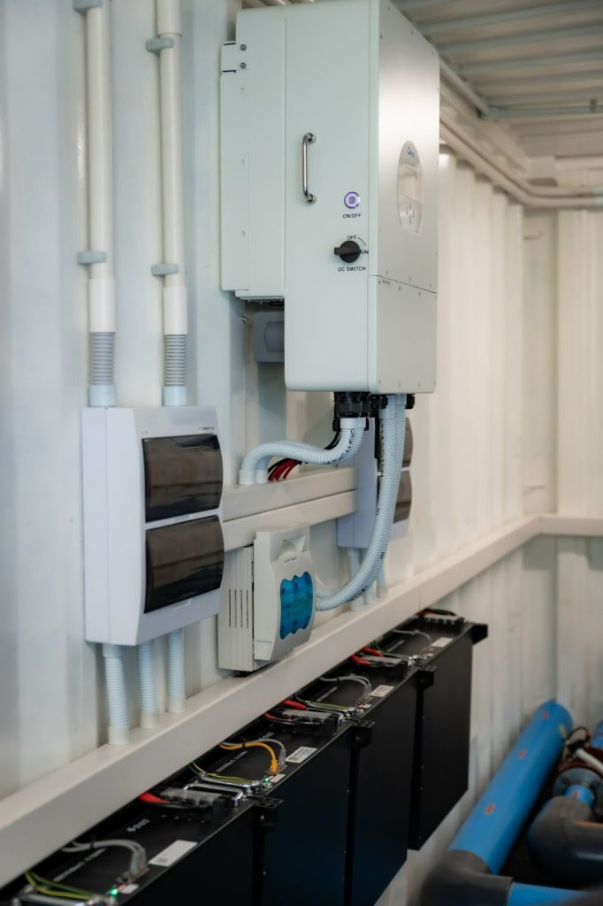 Containerised water-treatment plant with electrical control systems and filtration units.